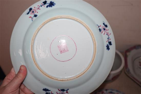 A pair of 19th century Chinese famille rose jardinieres, an 18th century Chinese famille dish and three plates